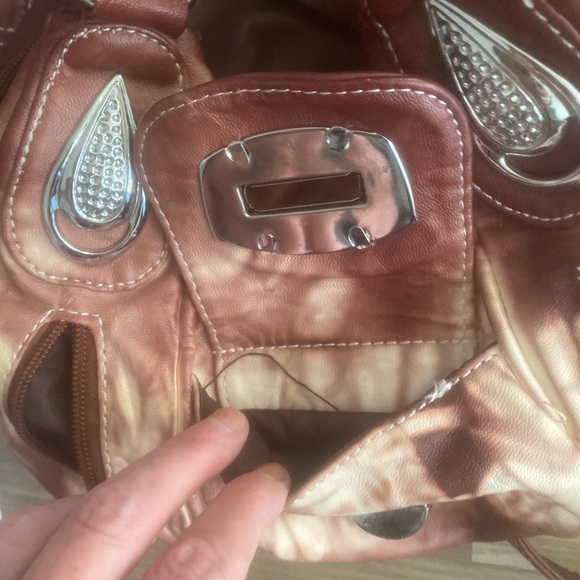 Never used gorgeous leather maroon and white purse. Perfect condition. - Picture 5 of 13